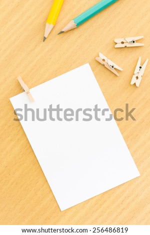 blank note paper with wood clip