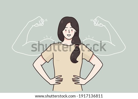 Woman power, female self confidence, high esteem concept. Brave confident smiling woman standing showing biceps shadows facing fears like powerful hero feeling powerful confident with inner strength 