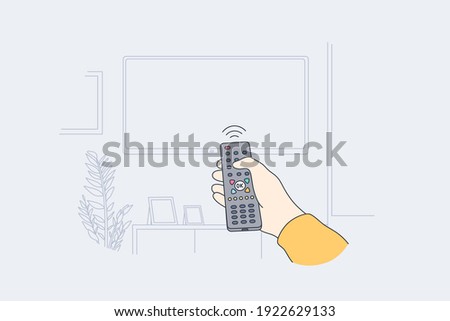 Television, home entertainment concept. Human hand with tv remote control switching television on at home for watching movies and programs vector illustration 