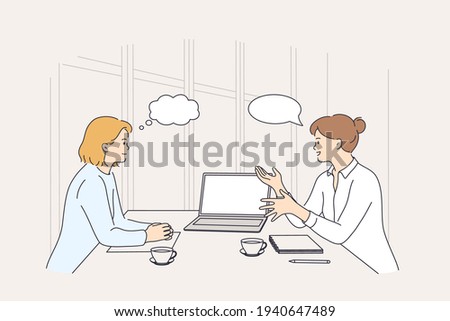 Business meeting, discussion, brainstorm concept. Two smiling businesswomen colleagues partners cartoon characters having meeting using laptop in office discussing strategy vector illustration 