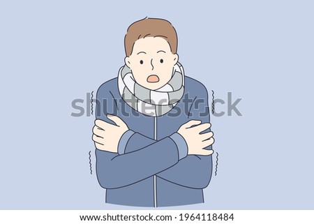 Feeling cold and frozen concept. Young man in warm coat and scarf standing feeling cold with surprised look vector illustration 
