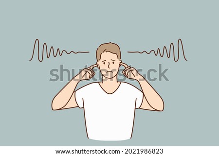 Covering ears and silence concept. Young sad irritated man cartoon character standing covering his ears with fingers with no sounds inside vector illustration 