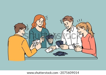 Friendship and leisure games concept. Group of young smiling friends sitting and playing cards together over blue background vector illustration 