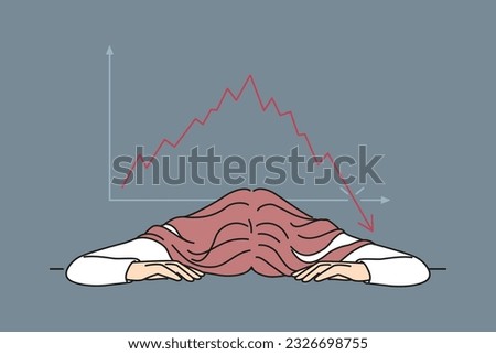 Bankrupt businesswoman put head on table near chart demonstrating crisis fall of stock market. Bankrupt woman investor upset by bad news about stock price decline or fed rate cut for lending