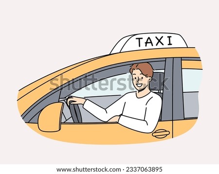 Man sits behind wheel of TAXI car and looks out window making career as public transport driver. Positive young guy TAXI driver looks at screen offering to get home quickly and safely