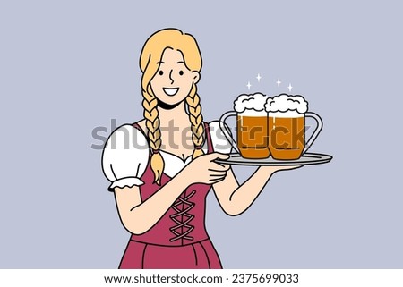 Woman waiter with beer on tray smiles, inviting to visit bavarian autumn festival to try alcoholic drinks. Two mugs with foamy ale or beer from bar in hands of girl serving guests at holiday party