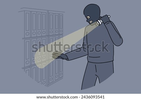 Spy steals documents and confidential data from office using flashlight and wearing mask to hide face from cameras. Spy breaks law to obtain insider information from corporations books.