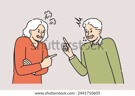 Quarrel elderly man and woman expressing mutual complaints or insults accumulated over years of marriage. Quarrel old people due to political differences and oppositional views on government actions