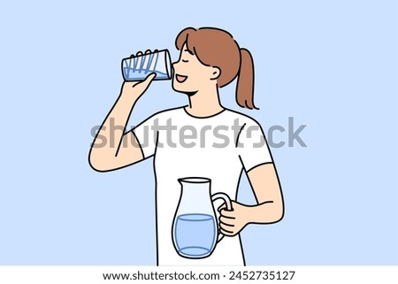 Woman drinks clean water from glass to refresh herself and saturate body with mineral aqua with vitamins. Girl with jug of water in hands, taking care of health, trying to avoid dehydration