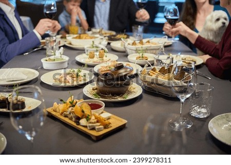 Similar – Image, Stock Photo Anonymous person eating toast with eggs and cheese