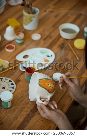 Similar – Image, Stock Photo artist painting on handmade waver in studio