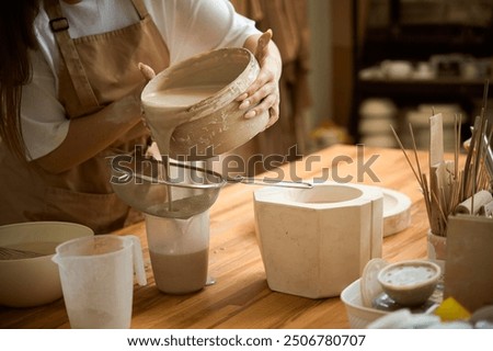 Similar – Image, Stock Photo Crop woman sculpturing pot with clay