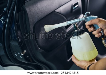 Similar – Image, Stock Photo Middle-aged man thoroughly cleans a tablet computer