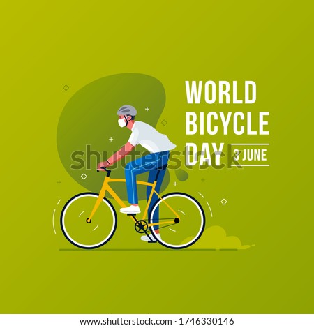 World Bicycle Day Concept. 
Men wear mask that ride bicycle