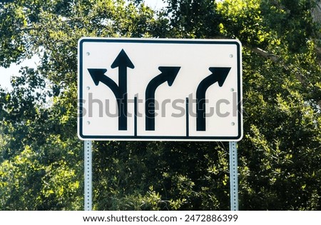 Similar – Image, Stock Photo arrow road sign on the street in the city