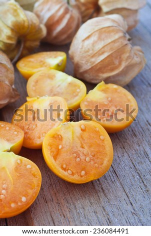 Cape gooseberry (Physalis) on wood table, healthy fruit and vegetable
