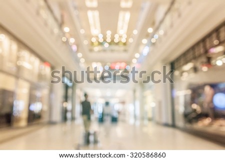 abstract image of people in town in the rush hour of a modern business center with a blurred background