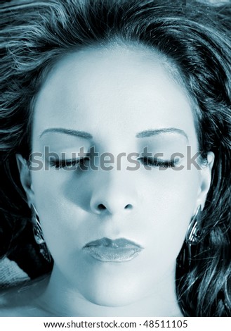 Face of Woman with closed eyes looking up