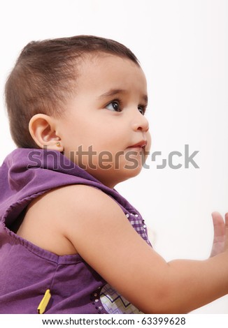 One year old girl profile over white  background