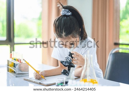 Similar – Image, Stock Photo Child looking through a toy kaleidoscope