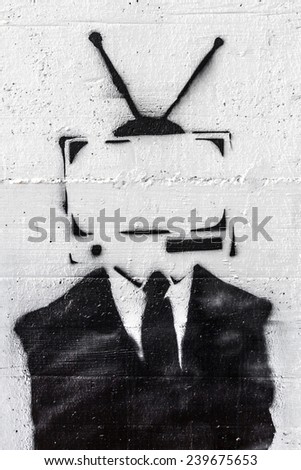 A representation of the mind control of the media on people.