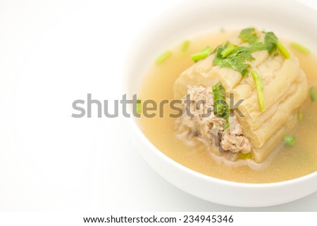 Close up of delicious Chinese / Thai bitter gourd with grounded pork soup for food on white background