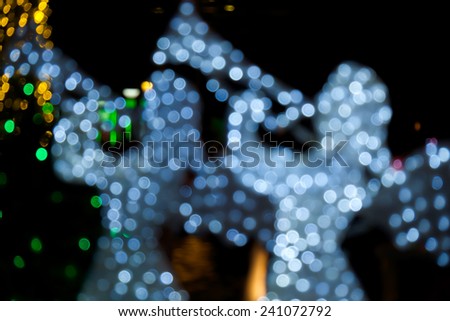 Angels white bokeh for Christmas holiday celebration to bring happiness background