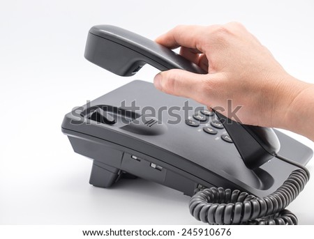 Close up of woman picking or answering the phone call with white background