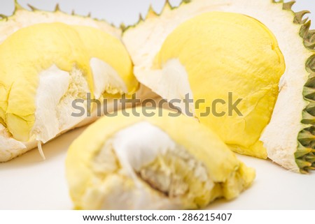 Isolated fresh tropical fruit, durian, king of fruits with yellow meat on white background