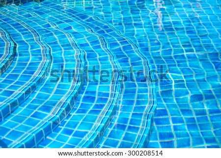De focused or soft view of blue swimming pool for outdoor activity background