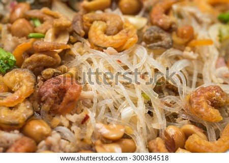 Delicious mixed vermicelli salad with seafood for local hot and spicy food background