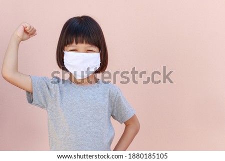 Similar – Image, Stock Photo Little cute short-haired girl throws leaves