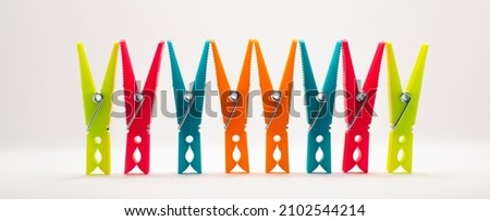 Colorful group of pegs in a line showing diversity of colors Foto stock © 