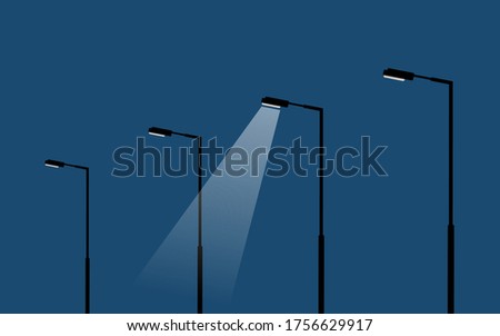 modern light poles/lamp stands on dark blue sky background, street lamps with the light spots, vector illustration, only one spot is lighting