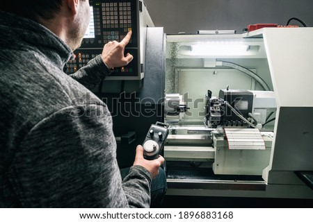 Cnc machine. The CNC lathe machine or Turning machine. Turning numerical control machine with tools and chuck fot automotive