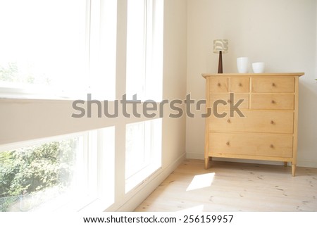 Cabinet in the corner of a room
