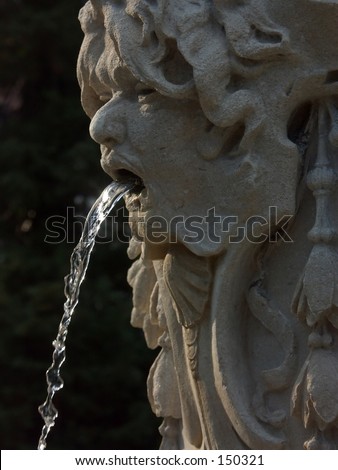 Portrait  with flowing water from the mouth, statue