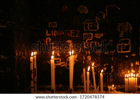 candels in temple, bolivian catolicism  Imagine de stoc © 