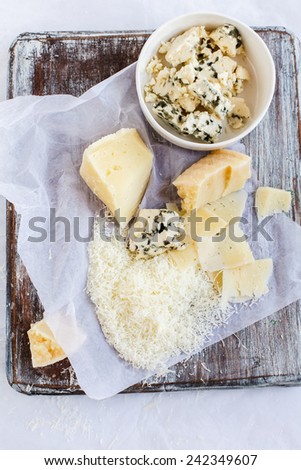 Cheese variety. Food background. Fresh ingredients on a wooden table