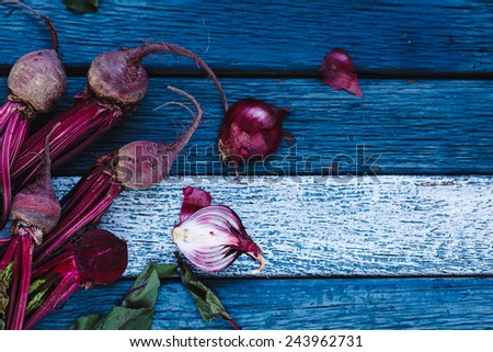 Fresh Organic Vegetables Healthy Herbs From Garden Red Onion And Beet On A Blue Fresh Organic Vegetables Healthy Herbs From Garden Red Onion And Beet On A Blue