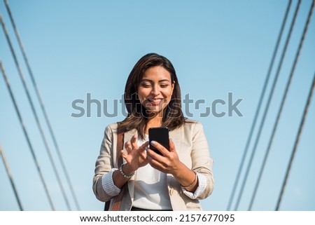 Similar – Image, Stock Photo Girl stands in her summer dress on the beach and admires the many waters