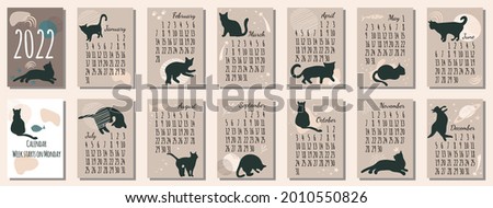 Calendar 2022 with black cat.Cute hand drawn kittens in boho style.Template in size A4.Vertical format. Week starts on Monday.Abstract stains and astrology.Set of 12 sketch animals.New year card