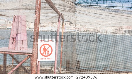No go area. area enclosed by a wire mesh
