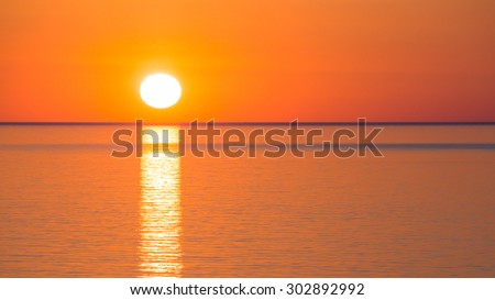 shape reflection sea. Sun reflection on the sea in a normal and foregone sunset