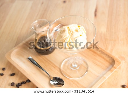 black coffee and vanilla ice cream on tray wood