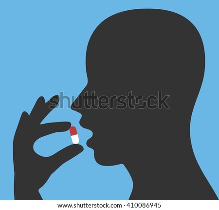 Taking the medicine capsule concept. Head with open mouth and a hand holding medical pill