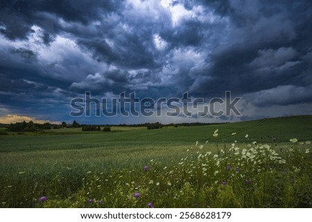 Similar – Image, Stock Photo Eerie cloud formation over the vast land