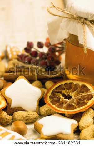 honey cookies with nuts and orange and honey on a table