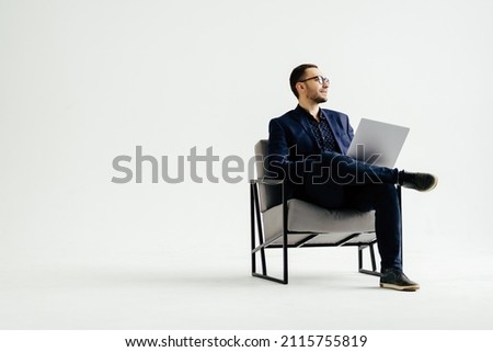 Similar – Image, Stock Photo Young man with modern haircut in urban background