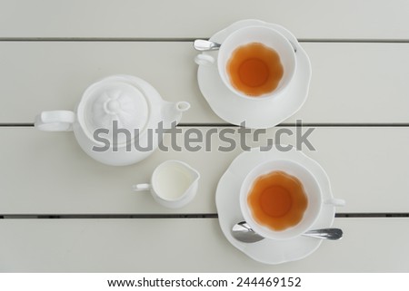 tea set on white table at evening tea time